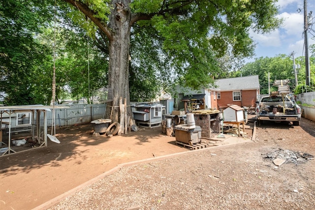 2217 Tate St, Charlotte, NC 28216 - view of yard featuring exterior structure and an outdoor structure