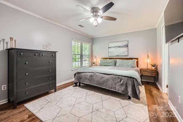 2009 Pinevalley Rd, Rock Hill, SC 29732 - bedroom featuring wood finished floors, crown molding, baseboards, and ceiling fan