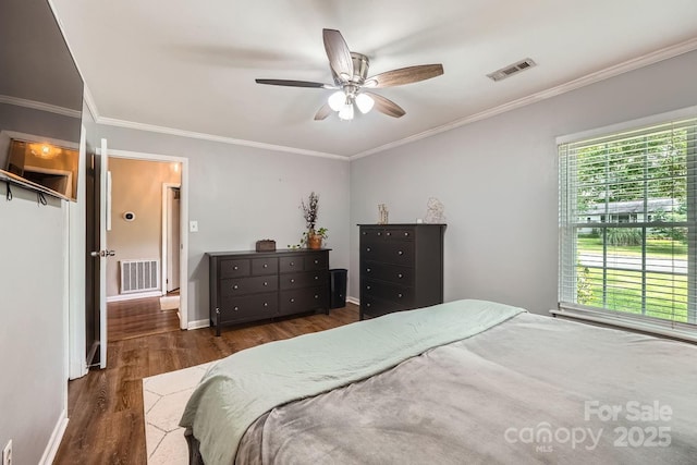 2009 Pinevalley Rd, Rock Hill, SC 29732 - bedroom featuring wood finished floors, ornamental molding, baseboards, and ceiling fan