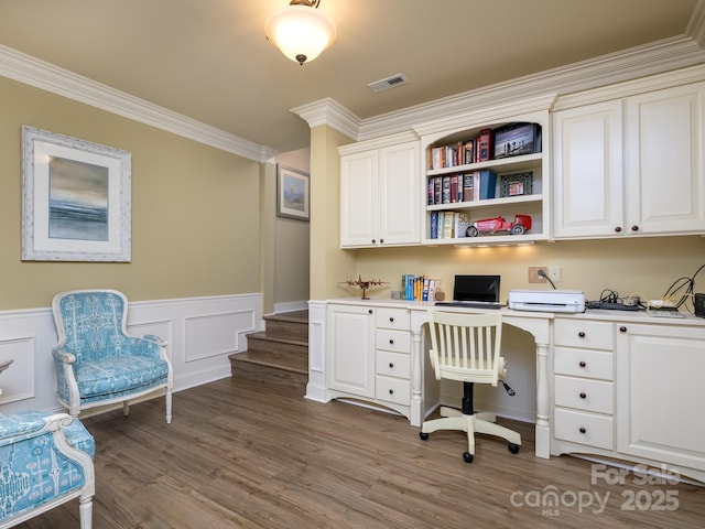 41 Annakesta Ct, Brevard, NC 28712 - office area featuring built in study area, wood finished floors, wainscoting, and ornamental molding