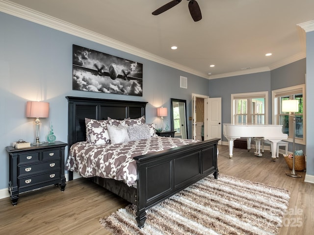 41 Annakesta Ct, Brevard, NC 28712 - bedroom with wood finished floors, recessed lighting, ornamental molding, ceiling fan, and baseboards