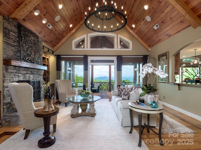 41 Annakesta Ct, Brevard, NC 28712 - living area featuring high vaulted ceiling, baseboards, a fireplace, recessed lighting, and arched walkways