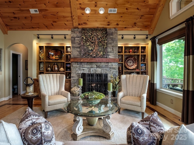 41 Annakesta Ct, Brevard, NC 28712 - living room with wood ceiling, rail lighting, wood finished floors, arched walkways, and plenty of natural light