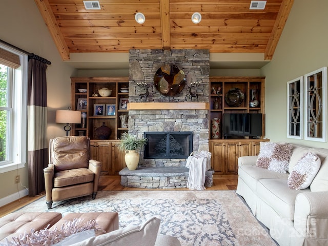 41 Annakesta Ct, Brevard, NC 28712 - living area featuring lofted ceiling, wooden ceiling, plenty of natural light, wood finished floors, and baseboards
