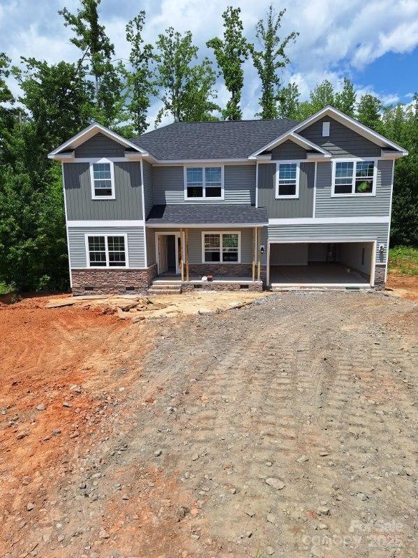 236 Mountain Island Rd Unit 40, Statesville, NC 28677 - craftsman inspired home featuring dirt driveway, a garage, and stone siding