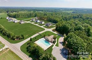 236 Mountain Island Rd Unit 40, Statesville, NC 28677 - aerial view of property and surrounding area with a pool area and a forest