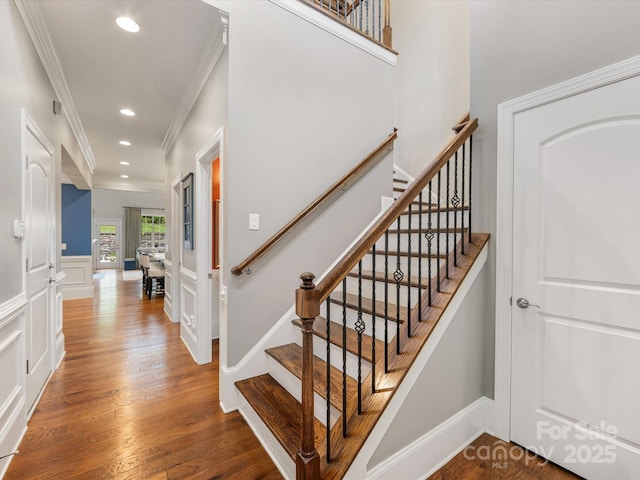 5030 Waldron Meadow Dr, Charlotte, NC 28226 - staircase with crown molding, wood finished floors, recessed lighting, and wainscoting
