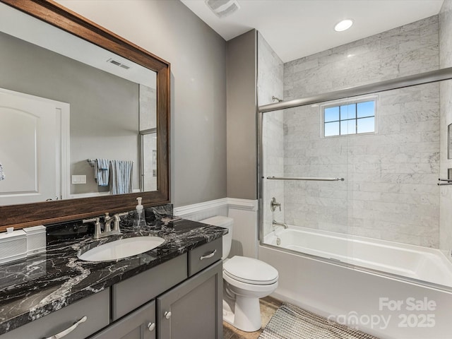 5030 Waldron Meadow Dr, Charlotte, NC 28226 - bathroom featuring toilet, vanity, and enclosed tub / shower combo