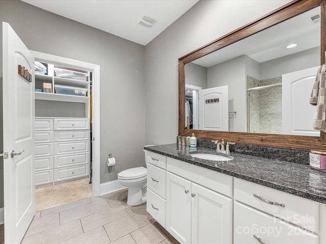 5030 Waldron Meadow Dr, Charlotte, NC 28226 - bathroom with a shower stall, toilet, a walk in closet, and vanity