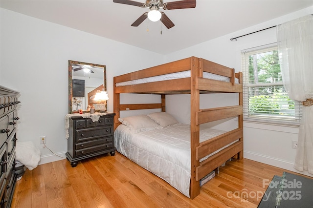 2320 Doster Rd, Monroe, NC 28112 - bedroom with baseboards, light wood-style floors, and ceiling fan