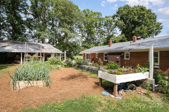 2320 Doster Rd, Monroe, NC 28112 - view of yard featuring a garden