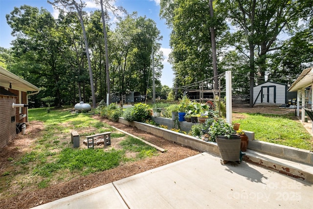 2320 Doster Rd, Monroe, NC 28112 - view of yard featuring a patio area and a garden