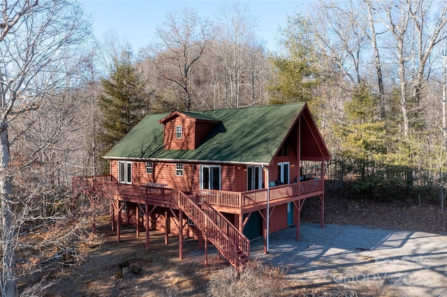 693 Blackberry Ridge Rd, Burnsville, NC 28714 - back of property with a deck and stairs