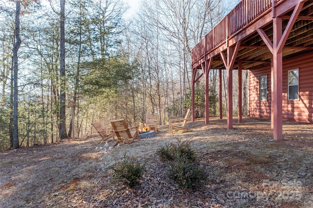 693 Blackberry Ridge Rd, Burnsville, NC 28714 - view of yard with a wooden deck and a fire pit