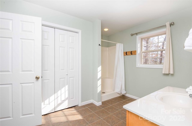 693 Blackberry Ridge Rd, Burnsville, NC 28714 - bathroom with a shower stall, baseboards, vanity, recessed lighting, and tile patterned floors
