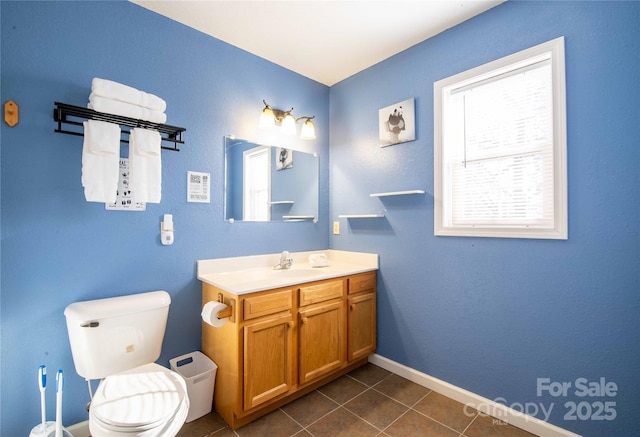 693 Blackberry Ridge Rd, Burnsville, NC 28714 - bathroom with vanity, tile patterned floors, toilet, and baseboards