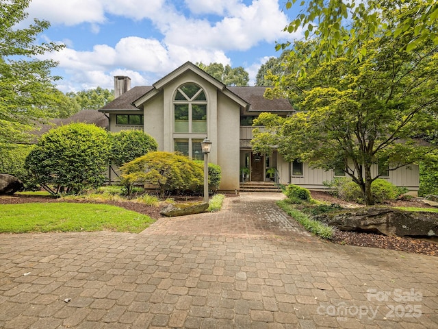 1360 Skunk Hollow Rd, Campobello, SC 29322 - view of front of house with a chimney and stucco siding