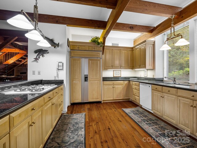 1360 Skunk Hollow Rd, Campobello, SC 29322 - kitchen featuring white appliances, a sink, plenty of natural light, beam ceiling, and dark wood-type flooring