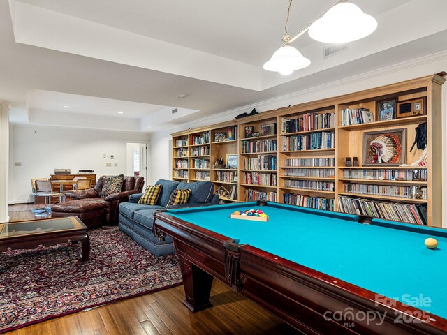 1360 Skunk Hollow Rd, Campobello, SC 29322 - rec room featuring a tray ceiling and hardwood / wood-style flooring