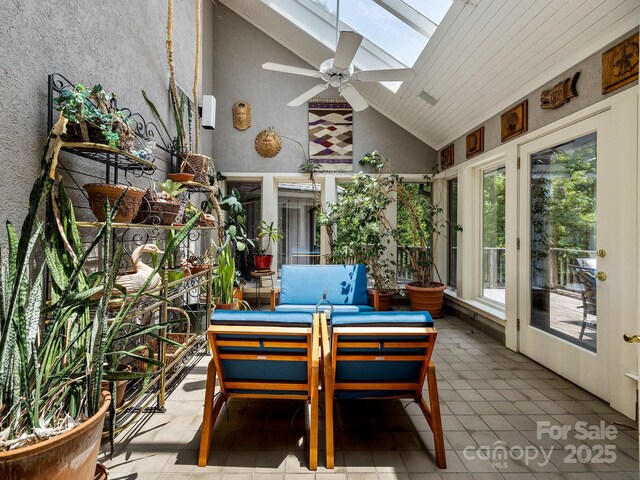 1360 Skunk Hollow Rd, Campobello, SC 29322 - sunroom with vaulted ceiling and a skylight
