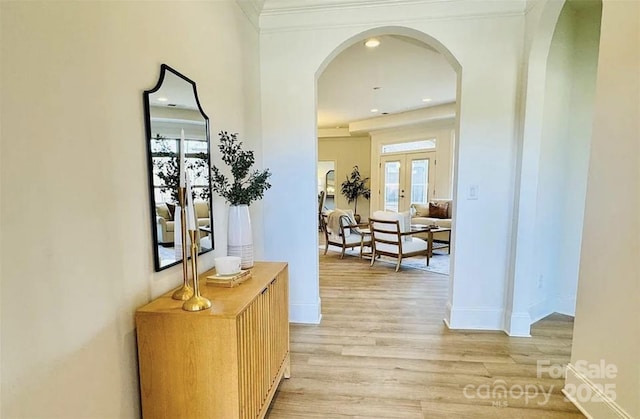 409 Newstyle Way, Gastonia, NC 28056 - hall featuring arched walkways, light wood-type flooring, recessed lighting, ornamental molding, and baseboards