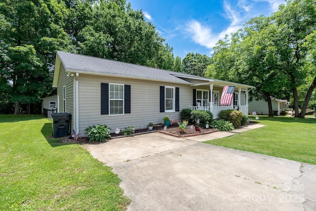 103 Poplar Trl, Rockwell, NC 28138 - single story home featuring covered porch, a front lawn, and a shingled roof