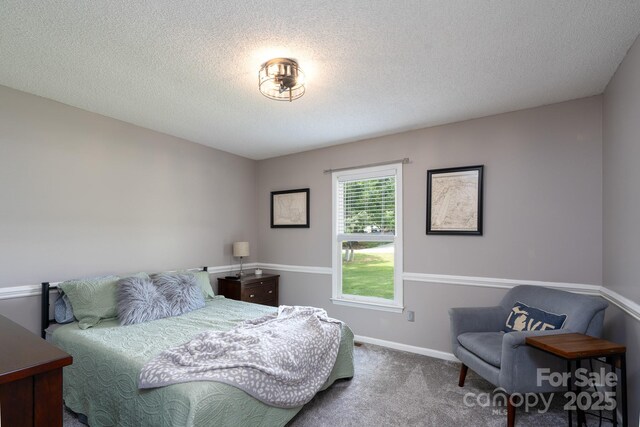 103 Poplar Trl, Rockwell, NC 28138 - carpeted bedroom with baseboards and a textured ceiling