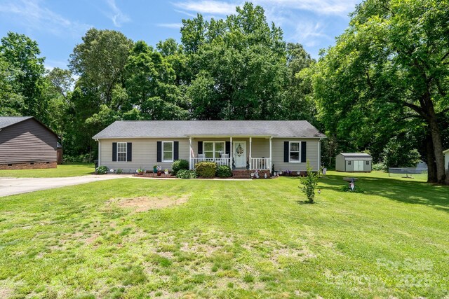 103 Poplar Trl, Rockwell, NC 28138 - single story home featuring covered porch, a front yard, and concrete driveway