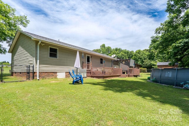 103 Poplar Trl, Rockwell, NC 28138 - rear view of property with a wooden deck and crawl space