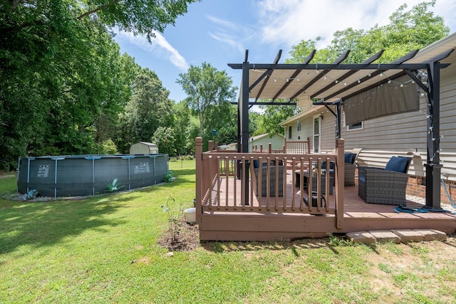 103 Poplar Trl, Rockwell, NC 28138 - view of green lawn with a pergola, a wooden deck, and an outdoor pool
