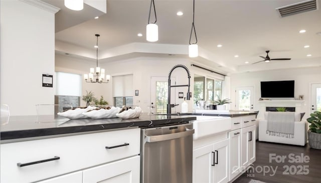 411 Newstyle Way, Gastonia, NC 28056 - kitchen with dishwasher, a tray ceiling, open floor plan, a ceiling fan, and recessed lighting