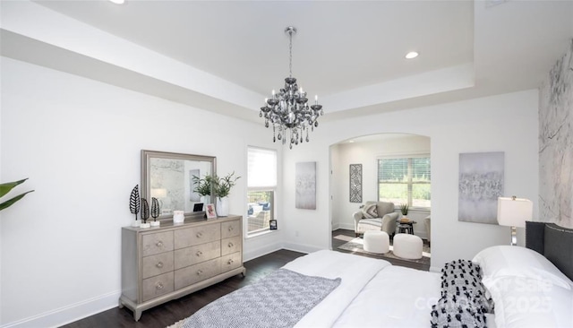 411 Newstyle Way, Gastonia, NC 28056 - bedroom with arched walkways, dark wood-style floors, multiple windows, recessed lighting, and a chandelier