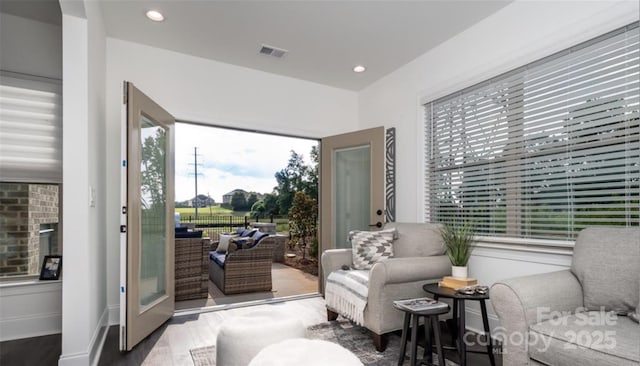 411 Newstyle Way, Gastonia, NC 28056 - sitting room featuring wood finished floors, healthy amount of natural light, and recessed lighting
