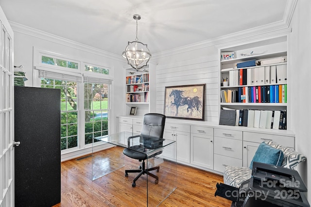 3506 Cardiff Ln, Matthews, NC 28104 - office space featuring light wood-type flooring, a chandelier, and crown molding