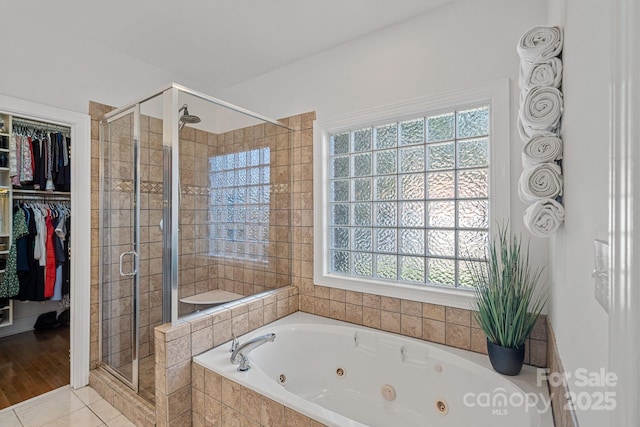 3506 Cardiff Ln, Matthews, NC 28104 - bathroom with a shower stall, a jetted tub, and healthy amount of natural light