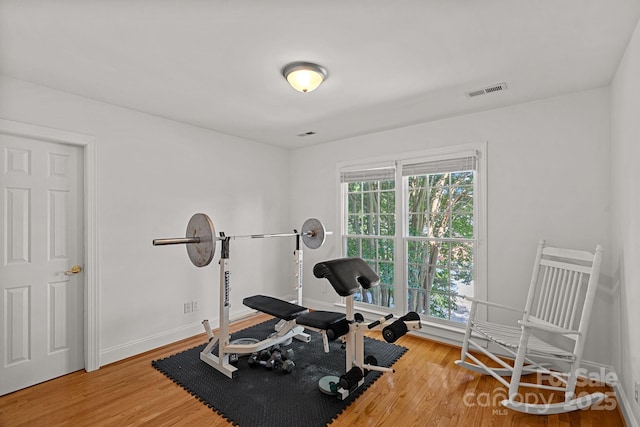 3506 Cardiff Ln, Matthews, NC 28104 - exercise area featuring wood finished floors and baseboards