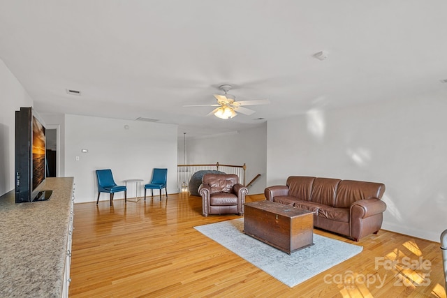 3506 Cardiff Ln, Matthews, NC 28104 - living area featuring light wood finished floors and a ceiling fan