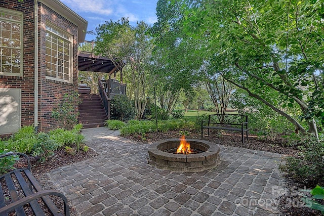 3506 Cardiff Ln, Matthews, NC 28104 - view of patio with a fire pit and stairway