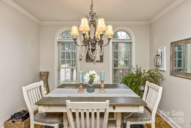 33 Stone House Rd, Arden, NC 28704 - dining area with a chandelier, ornamental molding, and baseboards