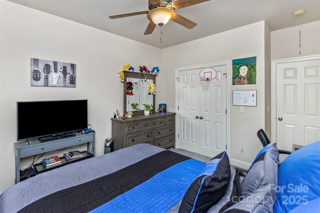 33 Stone House Rd, Arden, NC 28704 - bedroom featuring ceiling fan, a closet, and carpet