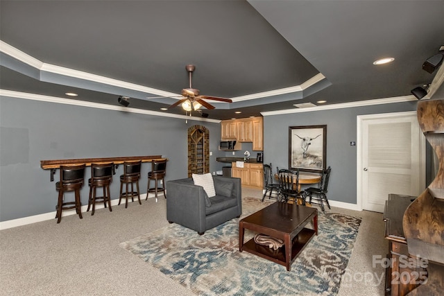 33 Stone House Rd, Arden, NC 28704 - living room with a tray ceiling, ornamental molding, baseboards, a ceiling fan, and recessed lighting