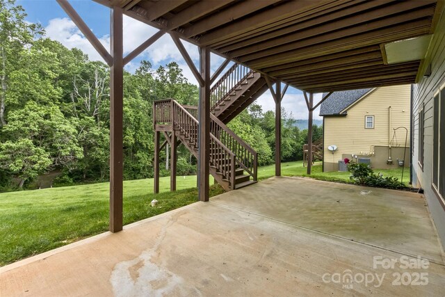 33 Stone House Rd, Arden, NC 28704 - view of patio / terrace featuring stairs and view of scattered trees