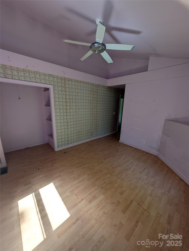 720 New Market Rd, Tryon, NC 28782 - bonus room featuring ceiling fan, wood finished floors, lofted ceiling, and baseboards