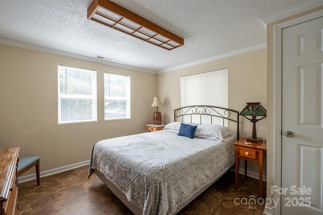 5430 Ela Rd, Whittier, NC 28789 - bedroom with a textured ceiling, ornamental molding, and baseboards