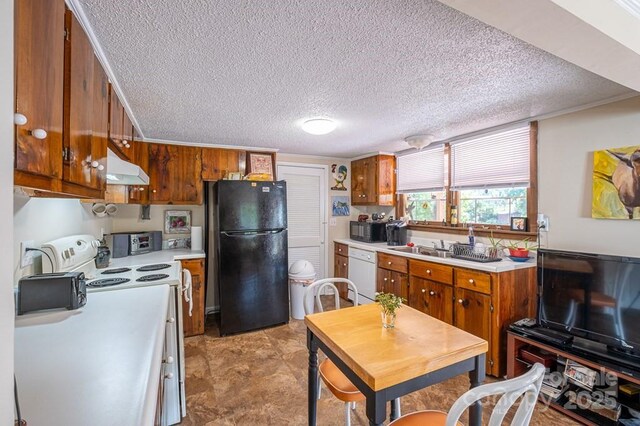 5430 Ela Rd, Whittier, NC 28789 - kitchen with black appliances, under cabinet range hood, a textured ceiling, light countertops, and brown cabinetry