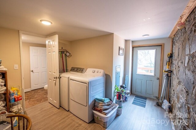 5430 Ela Rd, Whittier, NC 28789 - washroom with light wood finished floors and washer and dryer