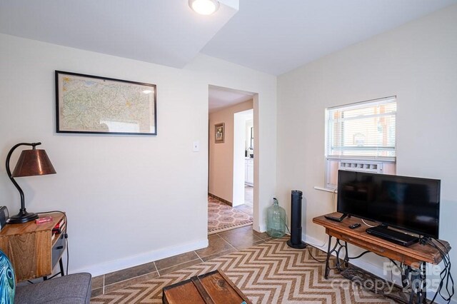 5430 Ela Rd, Whittier, NC 28789 - living area featuring baseboards and dark tile patterned floors