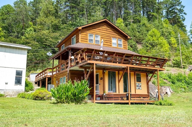 5430 Ela Rd, Whittier, NC 28789 - back of house with a yard, a deck, and central AC
