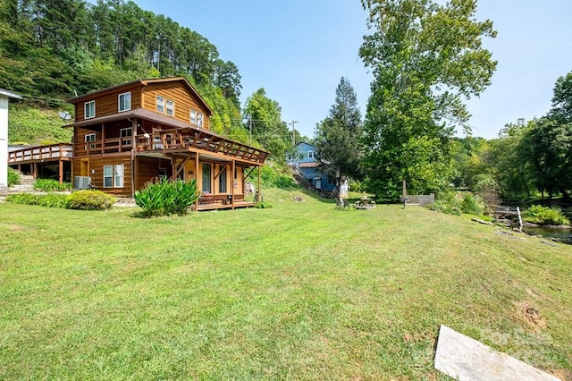 5430 Ela Rd, Whittier, NC 28789 - view of green lawn featuring a deck and central air condition unit