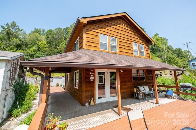 5430 Ela Rd, Whittier, NC 28789 - back of house with french doors, a deck, and roof with shingles